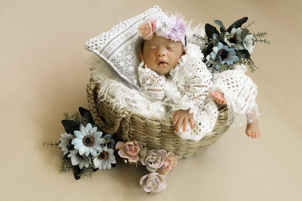 Newborn Sleeping in Basket
